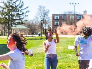 Students throwing color at each other for the HOLI Festival. 